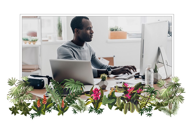 Hybrid worker on laptop at home desk