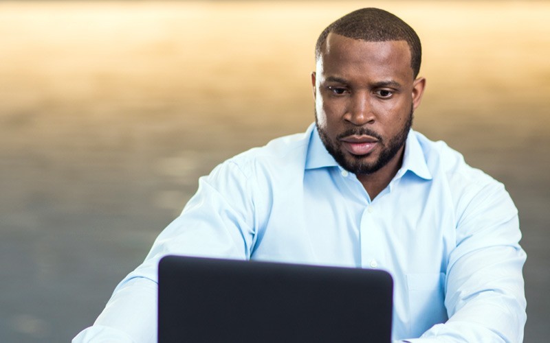 Elastic security services fabric keeps your sensitive data safe Business executive on notebook computer remotely