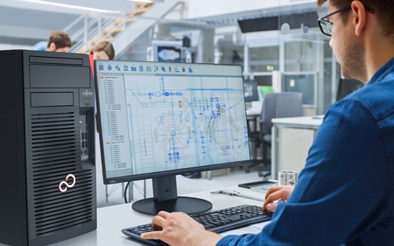 Man working on a Fujitsu workstation