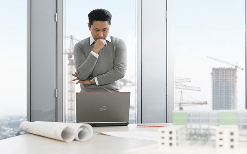 Man staring at a laptop screen