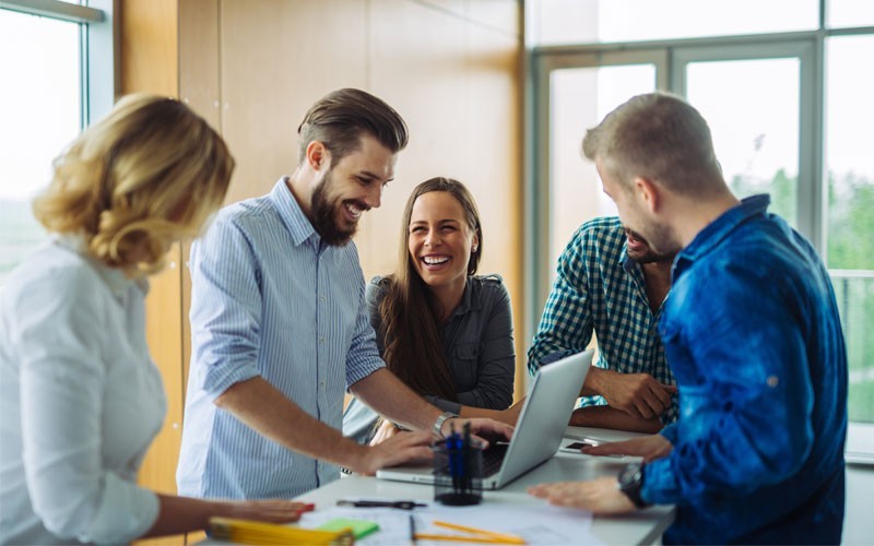 IBM Cloud offers the largest offering of database products Group of employees on laptop