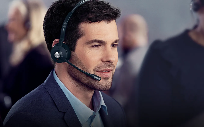 One headset for all phones Man talking on a Jabra PRO headset