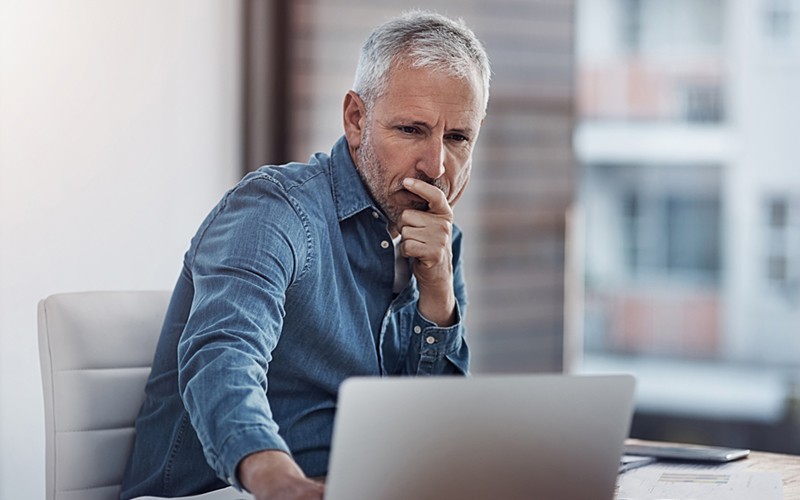 Lenovo for enterprise-grade storage solutions Business man working on laptop