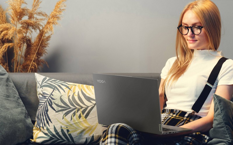 Evolve with Lenovo Woman working at laptop