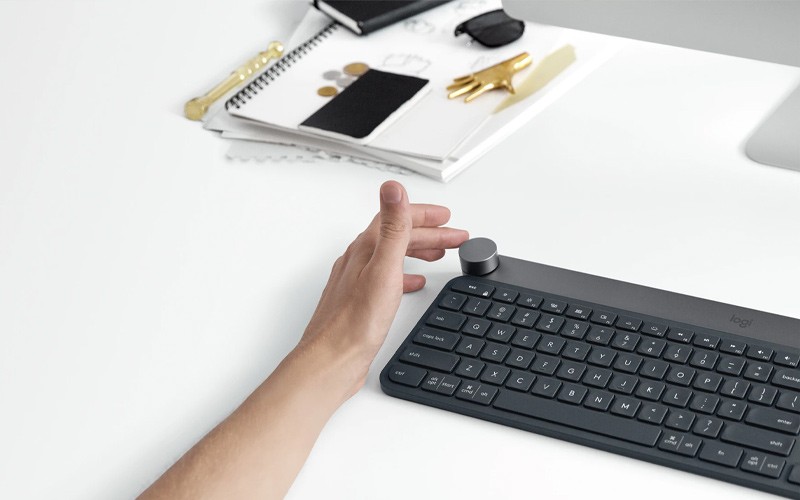 Enjoy a premium typing experience. Logitech Craft being used by a designer