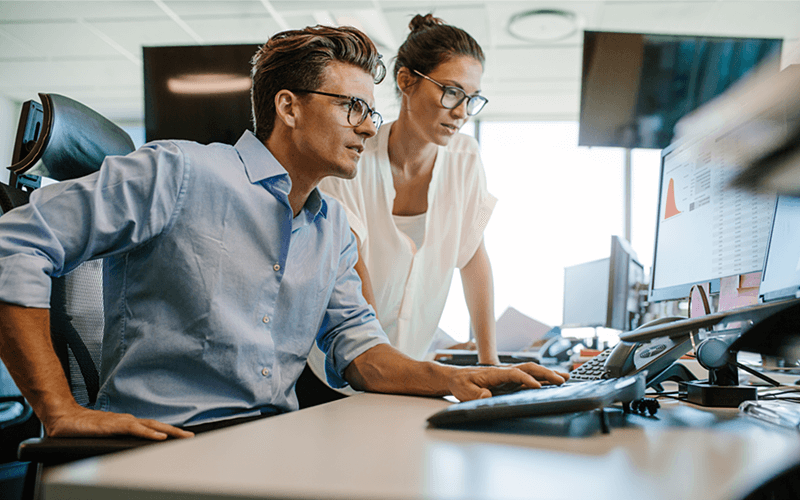 Symantec Advanced Threat Protection Two employees working together